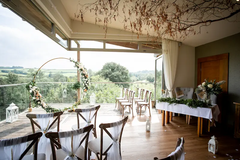 The Nest glass ceremony space at Tree Top Escape micro wedding venue, North Devon